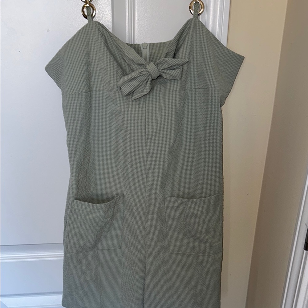 Elegant Green Romper with Bow Detail